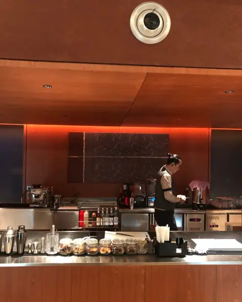 Bar counter with a barista