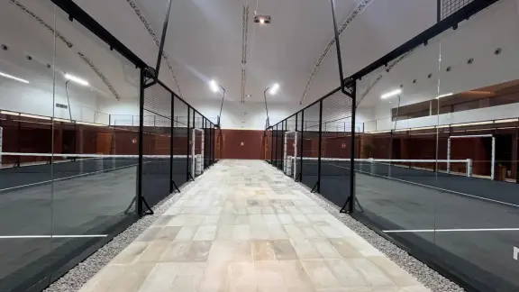 Walkway between two glass courts