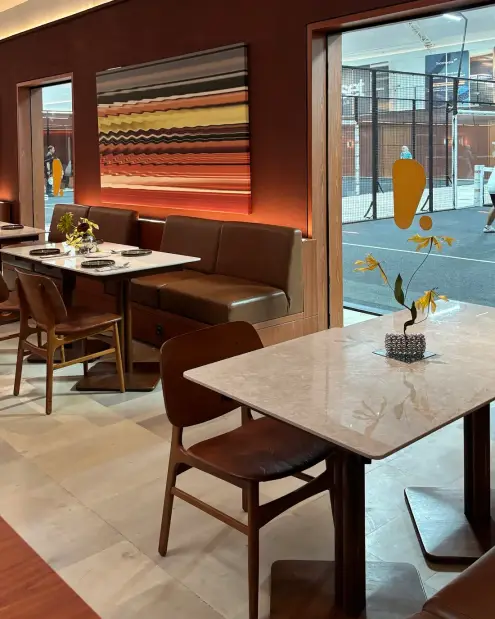Dining booths beside the courts