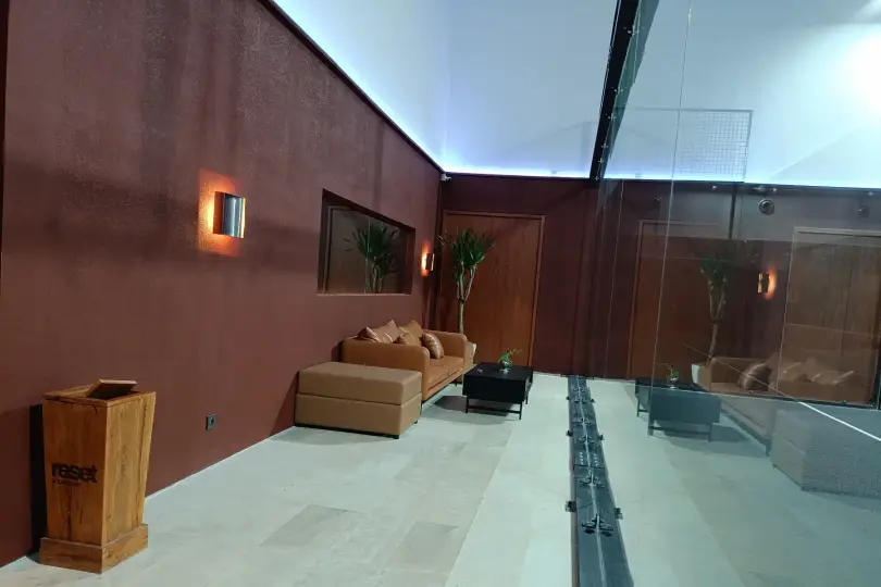 Sofa lounge on the walkway between courts