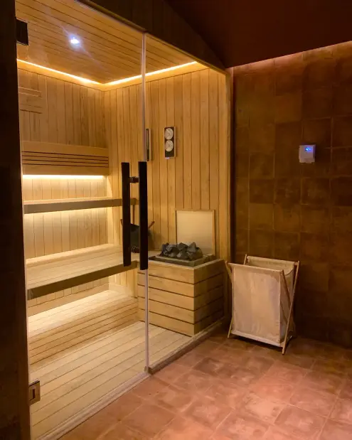 Timber sauna with glass door